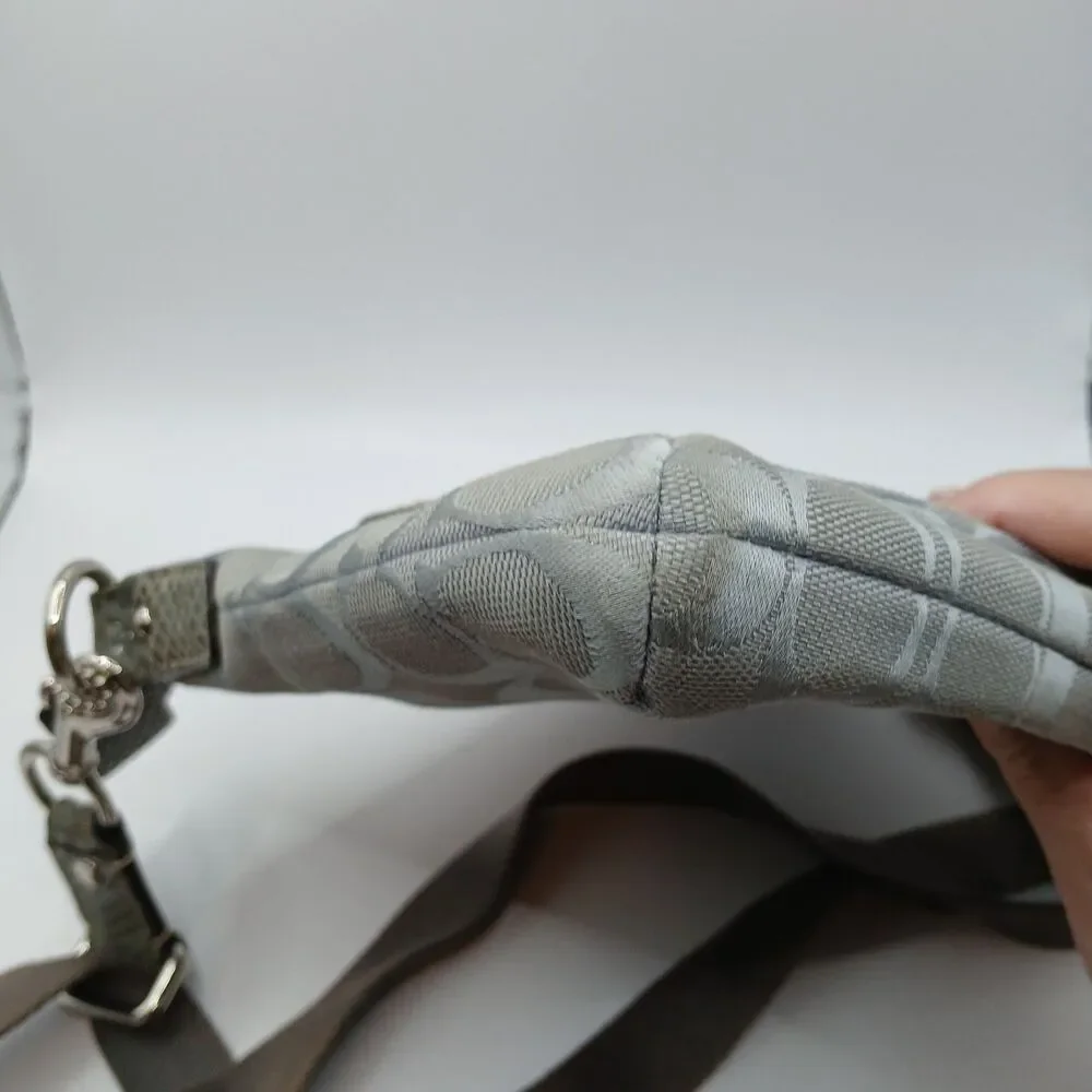 Coach Penelope Signature Turn-Lock Crossbody Bag in Silver With Lavender Lining